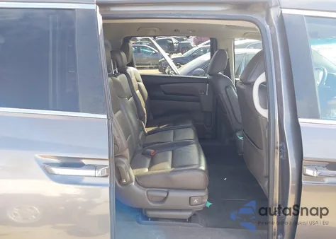 2011 Honda Odyssey Ex-L z USA, uszkodzony, nr VIN 5FNRL5H60BB007930